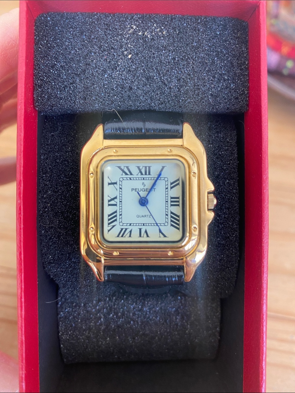 Peugeot Gold and Black Square Roman Numeral Watch